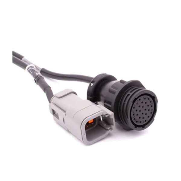 Close-up of two automotive electrical connectors attached to cables.